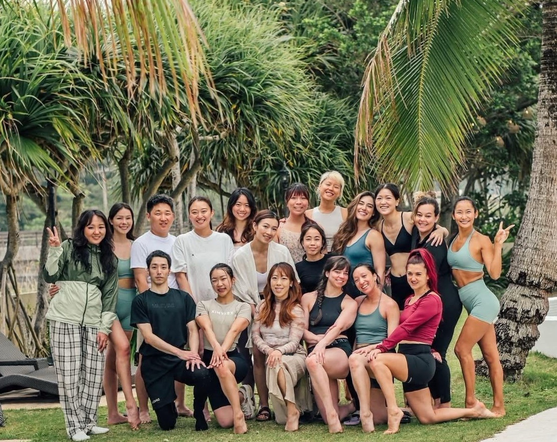 The international retreat community together in a tropical setting